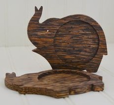 Coasters in the shape of an elephant made of palmwood