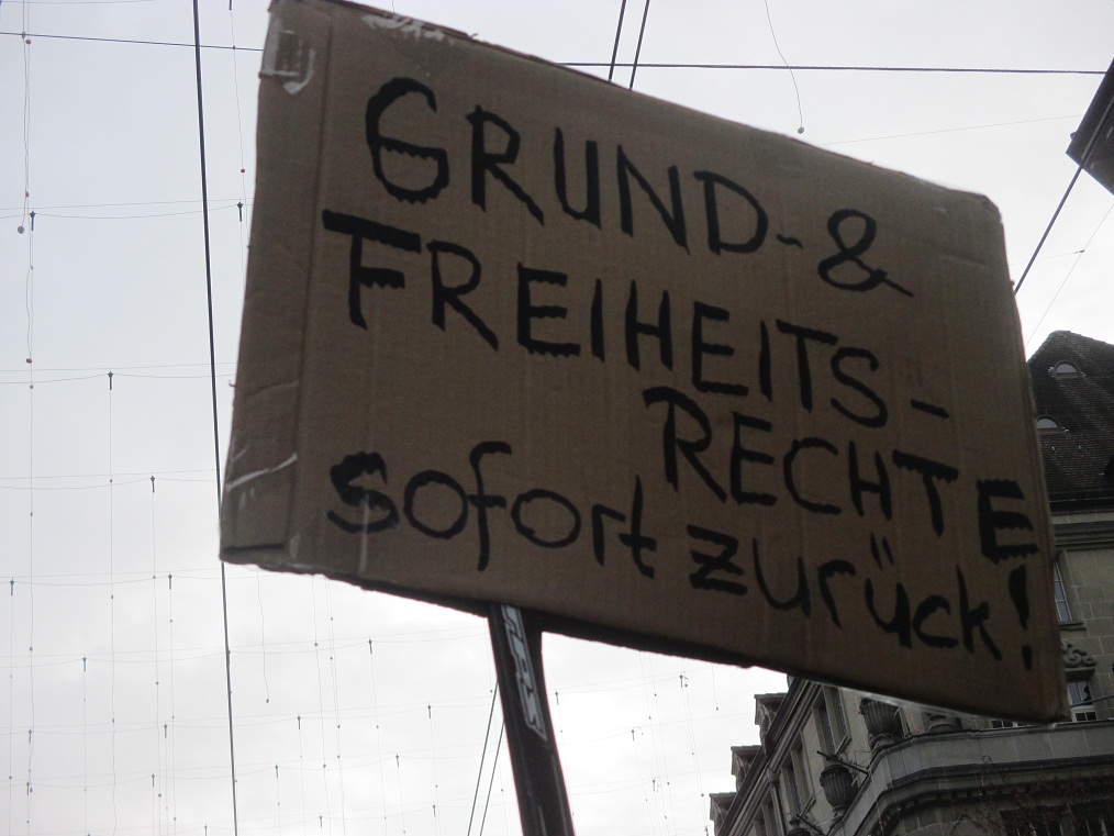 Demo in Zurich, Jan.8, 2022 13a+b: Basic rights
                    and freedom rights back at once (German: Grund- und
                    Freiheitsrechte sofort zurück!)