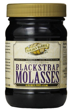 Mlasse de sucre, p.e. "Mlasse
                              de la bande noire du livre Brer"
                              ("Brer Rabbit Blackstrap
                              Molasses") dans un bocal