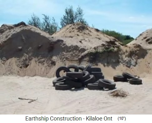 Killaloe, earthship construction 01
                                tires+ heaps of earth / sand