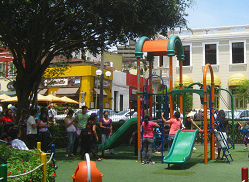 Playground castle with an artificial
                              lawn in Kennedy Park in Lima, Peru