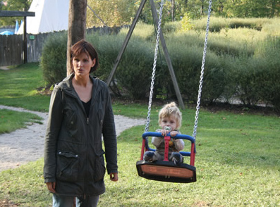 Baby swing with mother and child on
                                an adventure playground in Waidhofen,
                                Austria