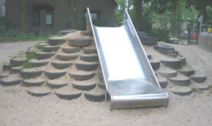 Broad slide on an artificial tire hill
                            in Hamburg-Lurup