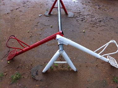 This seesaw of metal
                              was destroyed (probably by vandalism by
                              brainless adults), Paraguari, Paraguay