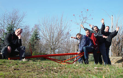 Seesaw with adults,
                              youth hostel of Dahlem, Berlin, Germany