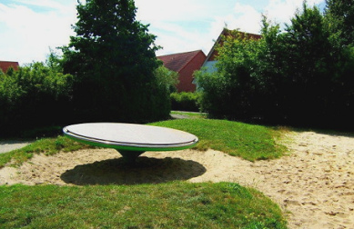 Seesawing roundabout
                              on the playground of Landgraben in
                              Halberstadt, Germany