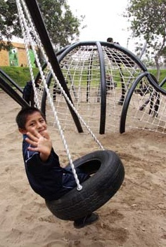 Tire swing 06 in Sinchi Roca Park
                              (parque Sinchi Roca) in Lima, Peru