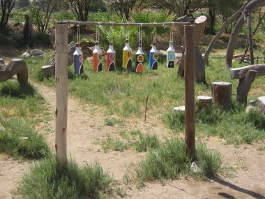 Bottle xylophone 01 on the playground
                              of Hari Krishna farm "Eco Truly"
                              in Lluta Valley near Arica in Chile