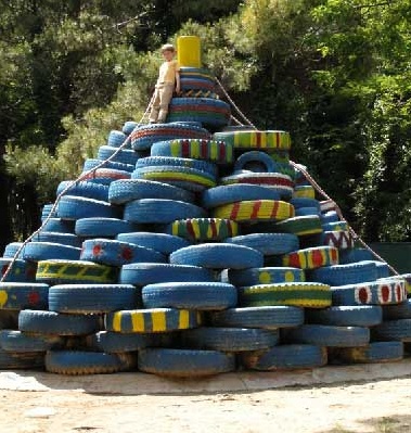 Climbing 10: climbing
                            pyramid made of painted tires in Marina de
                            Pisa, Italy