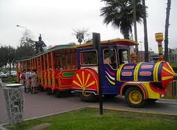 Park train 03+04, tractor
                                      train of Wall Park (parque
                                      Muralla) in red, Lima, Peru
