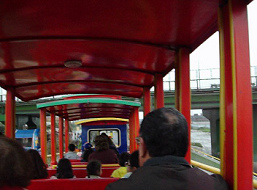 Park train (tractor train) of
                                      Wall Park (parque Muralla) in red,
                                      inner view, Lima, Peru