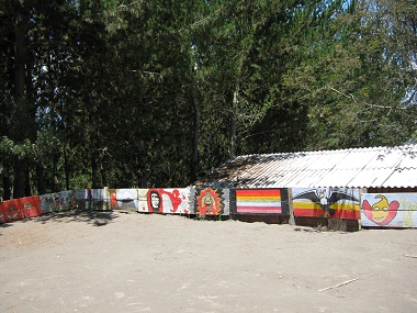 Soccer field with painted side
                                fence at Kitawa School in Salasaca 04,
                                Ecuadors
