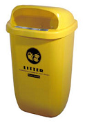 Abfallkbel aus Plastik, gelb,
                                hsslich, wirkt wie ein klobiger
                                Briefkasten