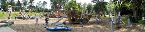 Ship with slide and a
                                        little swing boat on the
                                        playground of Herminghouse Park
                                        in Velbert (region of
                                        Wuppertal), Germany